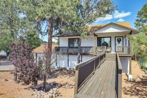 A two-story house with a wooden deck and a fenced yard. - Hike, Sled & Snowshoe! Family Retreat in Payson (Payson)