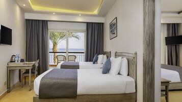 Familie suite | Een minibar, een kluis op de kamer, gratis wifi, beddengoed