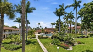 Property grounds - 1BR Marco Island condo with pool, WiFi, kitchen, and heated pool. (Marco Island)