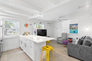 TV, books - Bayview Inn #101 | Updated & Steps to Bridge St (Bradenton Beach)