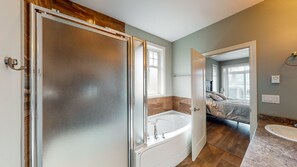 Combined shower/tub, hair dryer, towels, soap