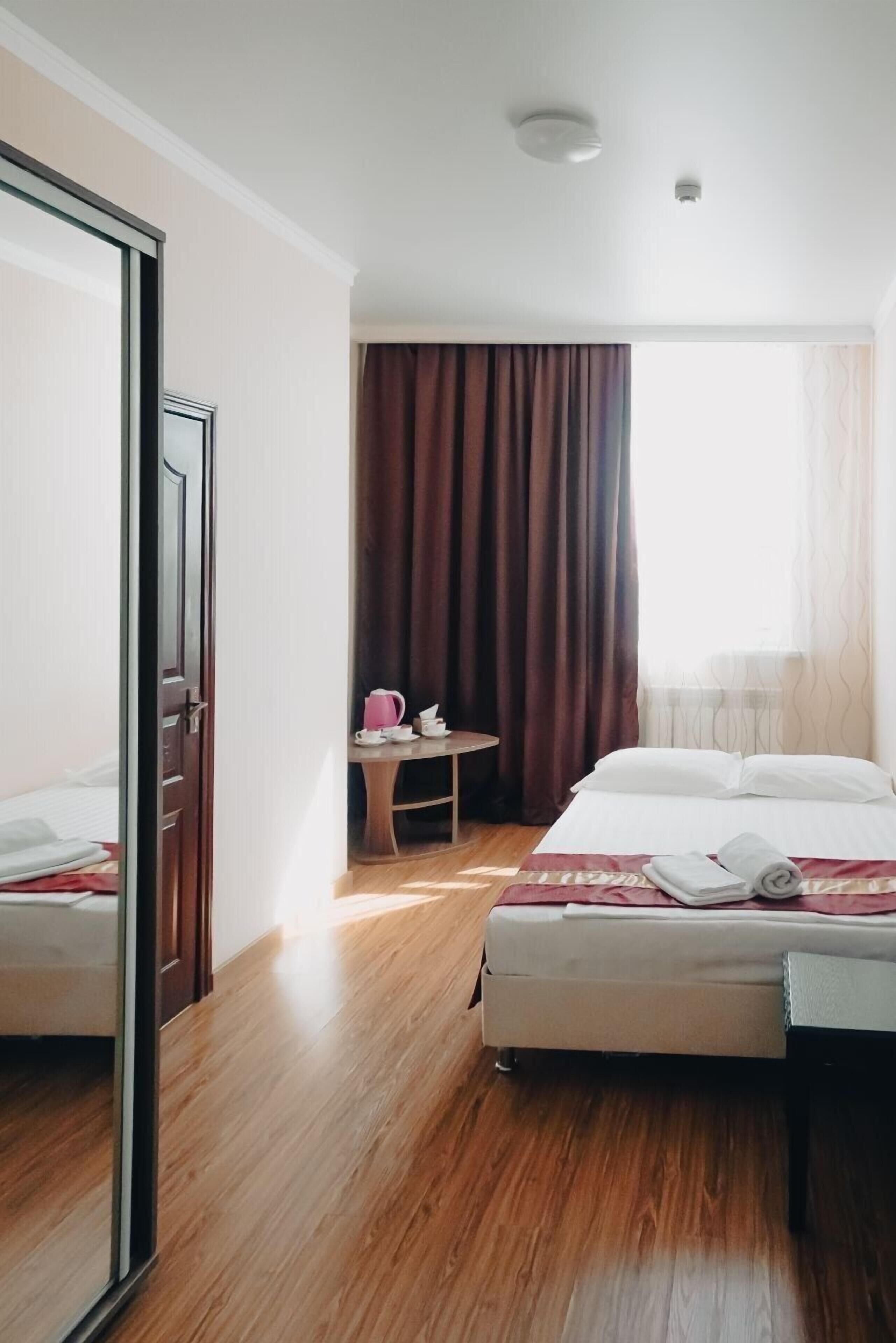 Desk, laptop workspace, free WiFi, bed sheets