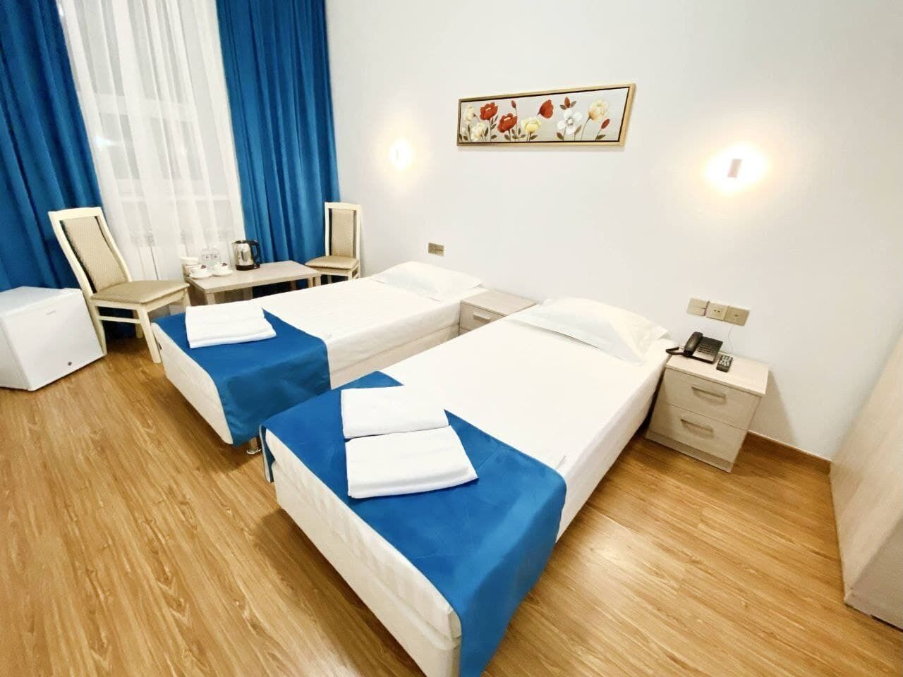 Desk, laptop workspace, free WiFi, bed sheets