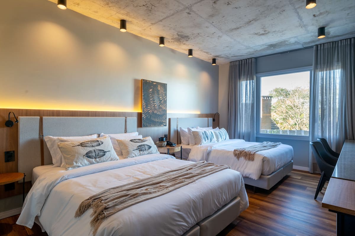 family quadruple room | 1 bedroom, minibar, in-room safe, individually decorated