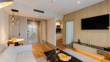 シグネチャー スイート キングベッド 1 台 禁煙 キッチン | リビング エリア | 薄型テレビ