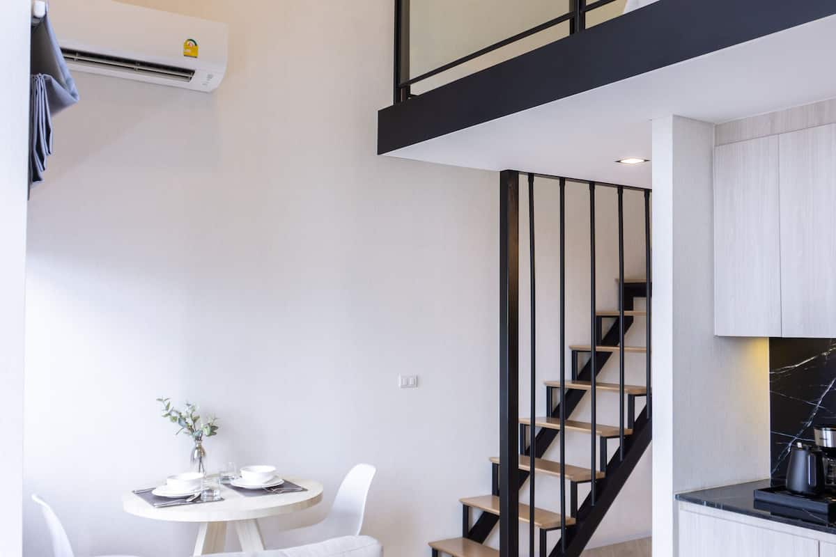 Premier Duplex, 1 Queen Bed | 1 bedroom, in-room safe, desk, laptop workspace