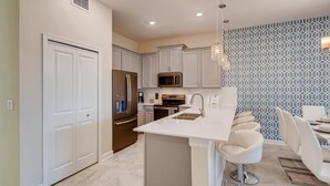 Unclassified image, 2 of 43, button - 547 OC - Golf View 2BR Luxury Townhome (Davenport)