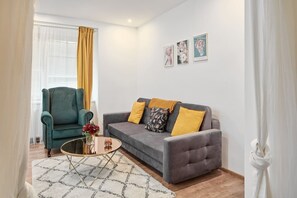 Luxury Apartment | Living area | Fireplace, smart speakers, computer monitors - Helen Homestay Zizkov (Prague)