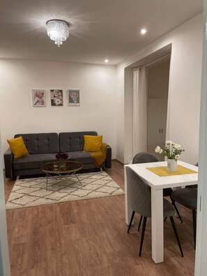 Luxury Apartment | Living area | Fireplace, smart speakers, computer monitors - Helen Homestay Zizkov (Prague)