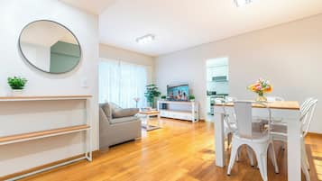 Family Apartment | Living area | 43-inch Smart TV with cable channels, TV, Netflix