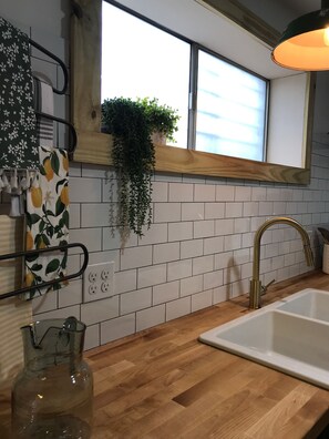 Shower, towels, soap, toilet paper