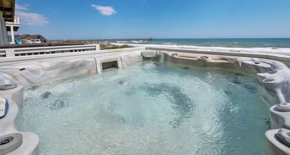 Heated Pool / Beachfront / Private hot tub / Elevator / Linens Included