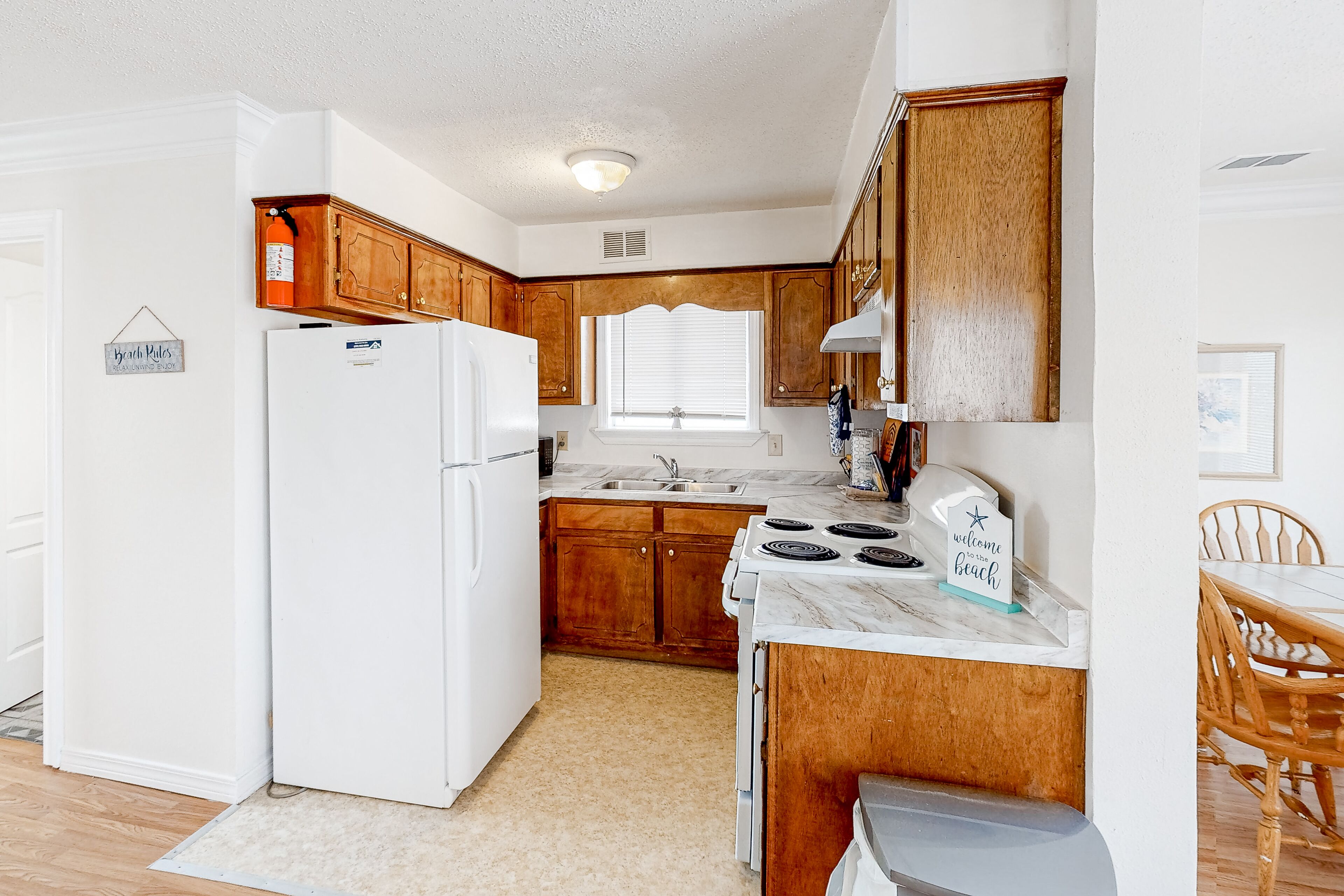 Dog-friendly, beachside getaway with AC, & W/D - walk to beach access & dining