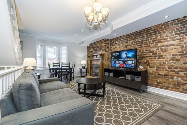 Premium Apartment, 2 Bedrooms, Terrace, City View (The Dovercourt) | Living area | 50-inch flat-screen TV with digital channels, TV, Netflix - St Annes Suites (Toronto)