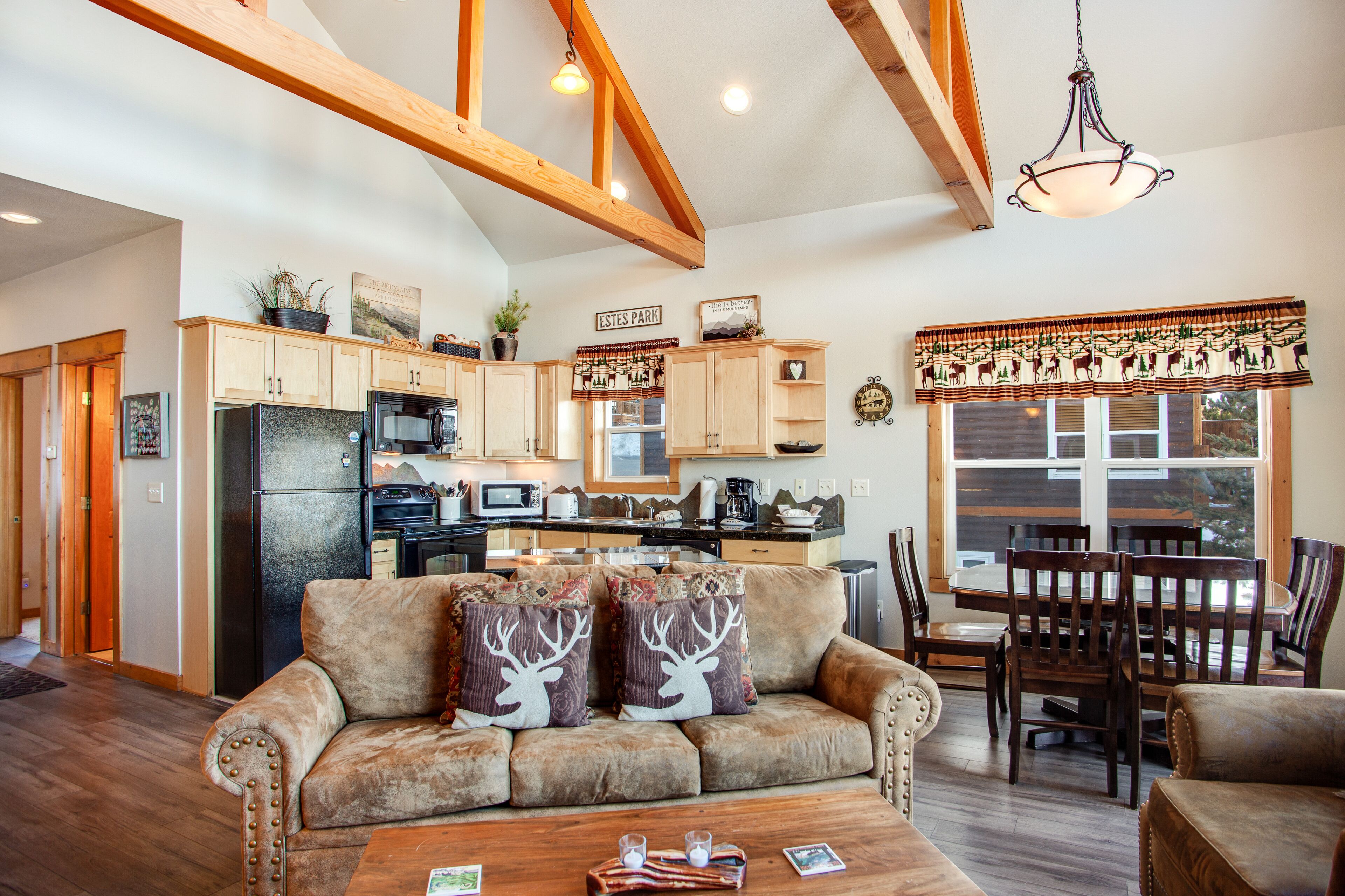 Two-story mountain view condo with deck, hot tub, two gas fireplaces, and A/C