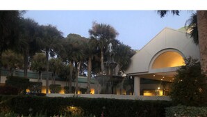 A modern building with a large arched entrance and a fountain in the center. -  Poolside #, Westin Amenities Included with your stay.  #133 (Hilton Head Island)