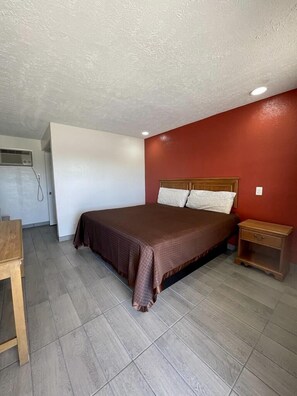 Room, 1 King Bed, Smoking | Iron/ironing board, free WiFi, bed sheets