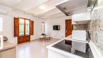 Apartamento, suíte (1-4 pax) | Lounge