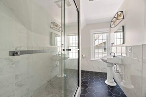 Shower, hair dryer, towels, soap