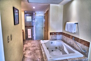 Jetted bath, hair dryer, towels, soap