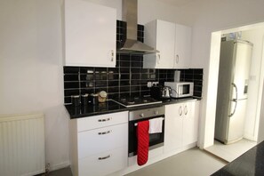 Comfort House | Private kitchen | Fridge, electric kettle - Albert House (Rotherham)