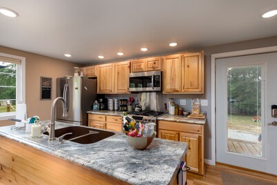 Lake front home with access to two lakes, large yard and RV hookup available!