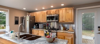 Lake front home with access to two lakes, large yard and RV hookup available!