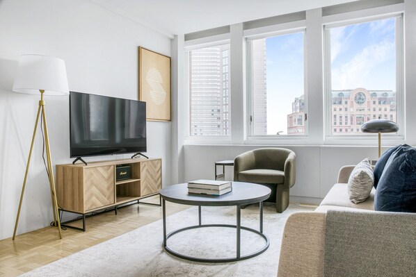 TV, stereo - Lovely Back Bay 1BR w/ W/D & Gym, near Copley T & Shops, by Blueground (Boston)