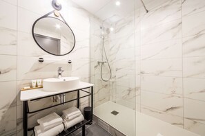 Eco-friendly toiletries, hair dryer, towels