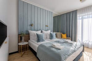1 habitación, tabla de planchar con plancha, wifi gratis y ropa de cama 