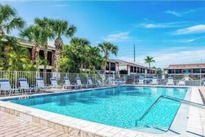 Outdoor pool, a heated pool - Charming Ground Floor, 2bd-2bh Condo, 2 miles to Beaches, Private W/D  (Englewood)