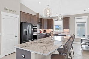 Fridge, microwave, oven, stovetop - Karen K II / 102 E Beach Drive - Coastal Vacation Resorts (Oak Island)