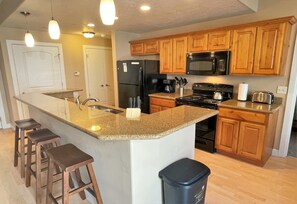 Condo, 1 Bedroom | Private kitchen | Fridge, oven, coffee/tea maker, toaster