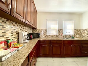 Apartment, 2 Bedrooms | Private kitchen | Fridge, oven, stovetop, coffee/tea maker