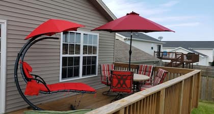 6 bedrooms, 3 full bathrooms. 10 minutes to State Farm, Rivian, and ISU.