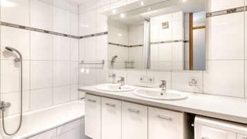 Family Apartment | Bathroom | Bathtub, hair dryer, towels