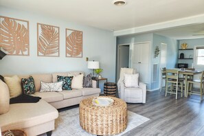 TV, books - Canal-front home with fast WiFi, central ac, and private dock (Ocean City)