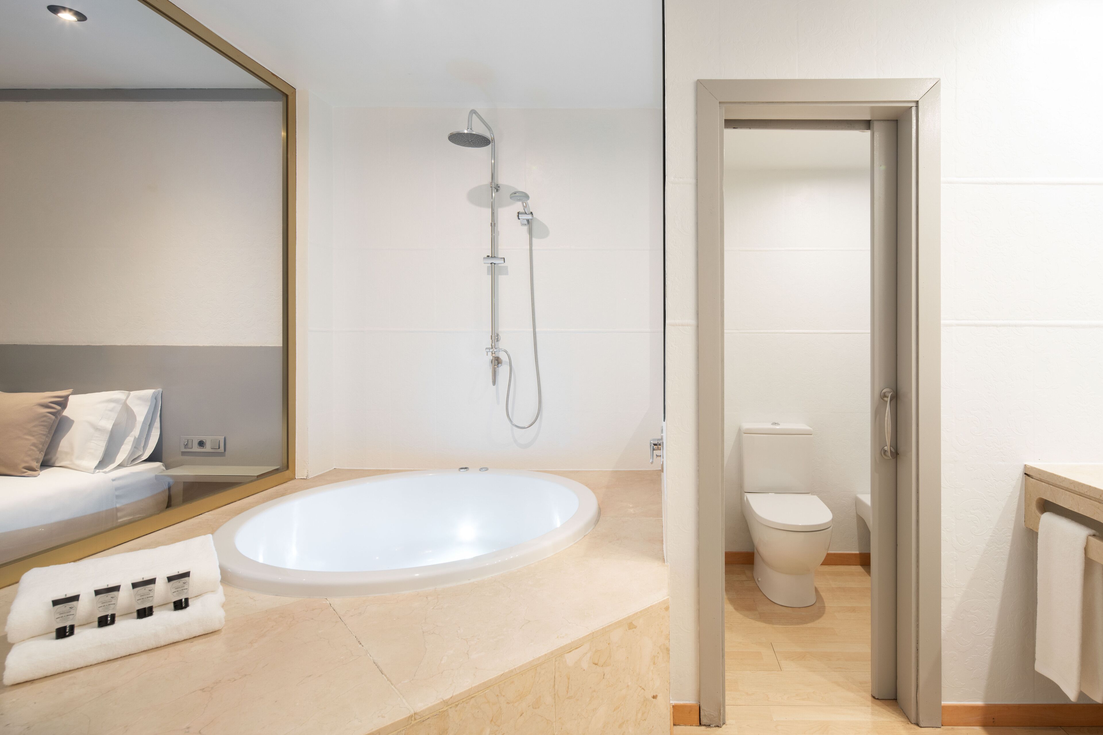 premium room | bathroom | deep-soaking bathtub, free toiletries, hair dryer, slippers