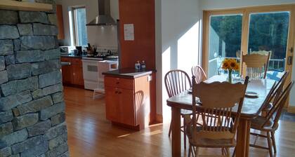 Large relaxing house in 25 acres of private woods with lake access.