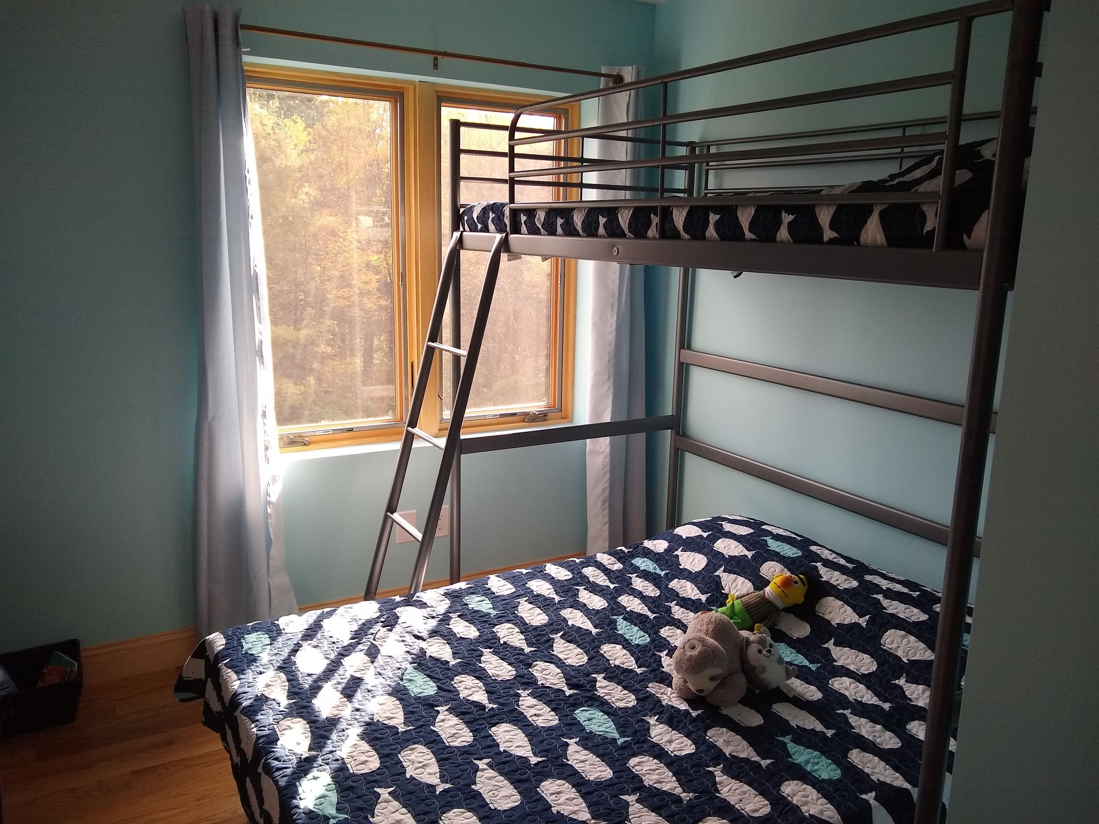 Large relaxing house in 25 acres of private woods with lake access.