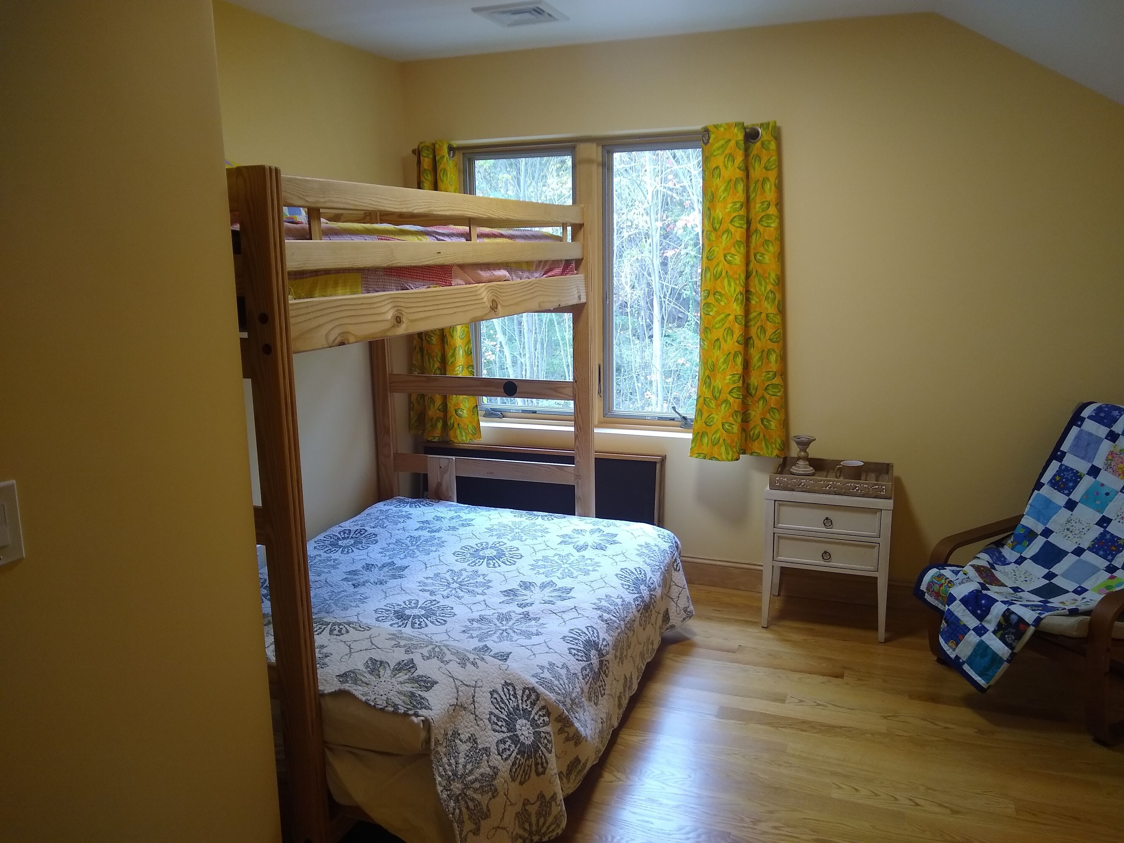 Large relaxing house in 25 acres of private woods with lake access.