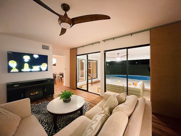 Smart TV, fireplace, books, music library