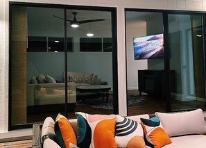 Smart TV, fireplace, books, music library