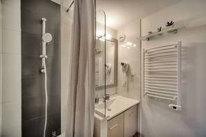Hair dryer, towels, toilet paper