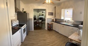 Fridge, microwave, oven, stovetop - Belknap Guest House-One block from historic downtown square in Jacksboro, Texas (Jacksboro)