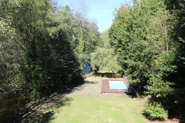 River, garden and pool.