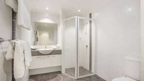 Bathtub, hair dryer, towels