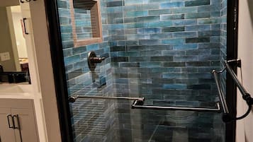 Bathtub, hair dryer, towels, soap