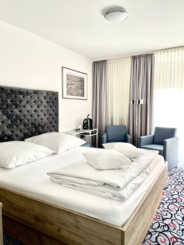 Hypo-allergenic bedding, desk, blackout curtains, soundproofing