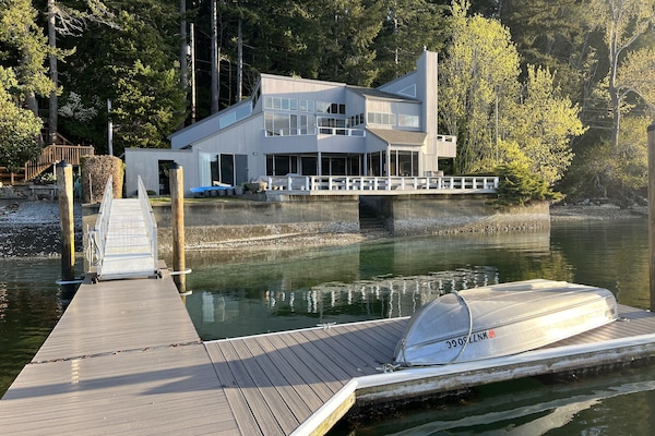 House from the water on the newly refurbished dock